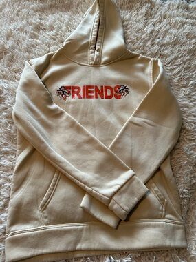 FRIENDS Cream Hoodie with Red Logo and Graphic Accents